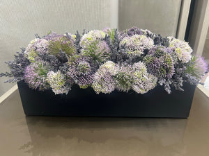 Black Vase with Purple, Green, and White Flower Arrangement Greenery.