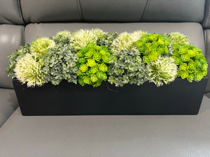 Flower Arrangement with Beautiful Greenery.