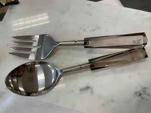 Stainless steel salad servers with brown lucite handles