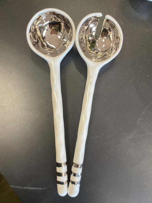 White and silver porcelain salad servers