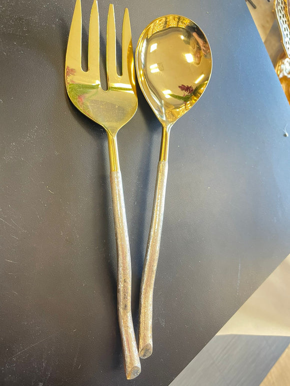 Gold salad servers with silver bottom
