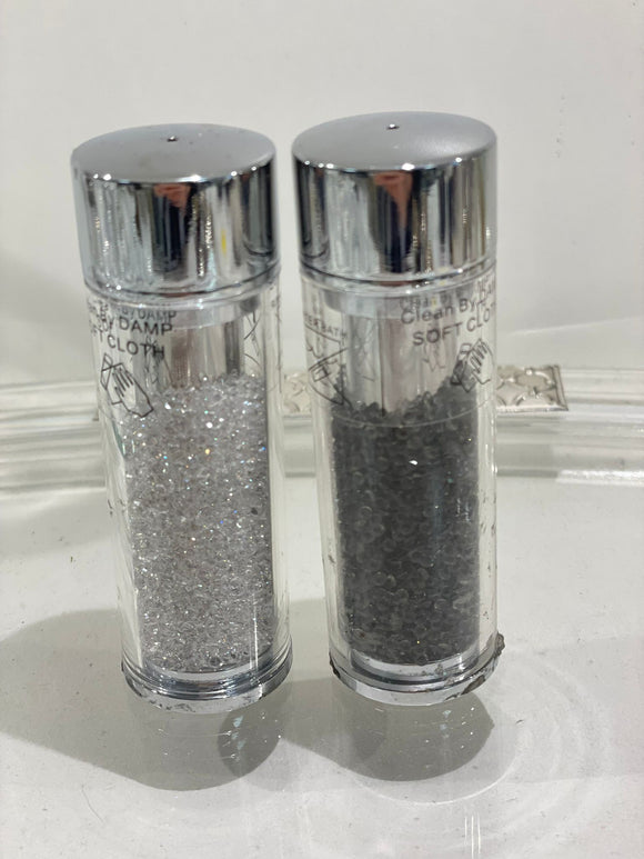 Salt and pepper shakers with crystals