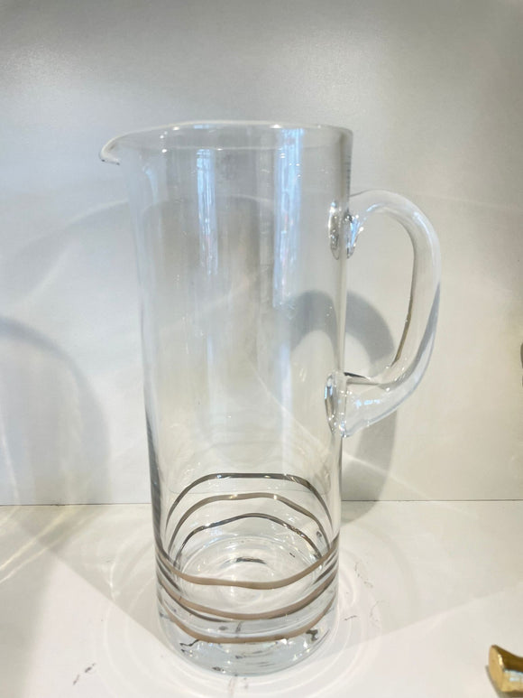 Glass pitcher with silver swirl