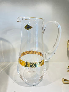 Glass pitcher with silver swirl