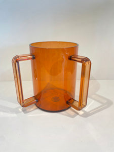 Orange lucite washing cup
