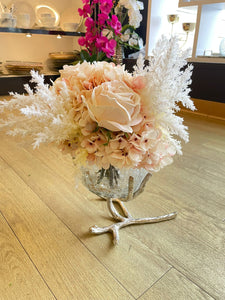 White and light pink flower arrangement