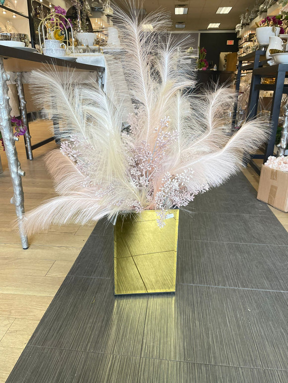Feather arrangement in Gold Vase