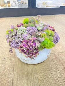 Colorful Flowers in marble pot
