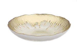 gold and white glass salad bowl