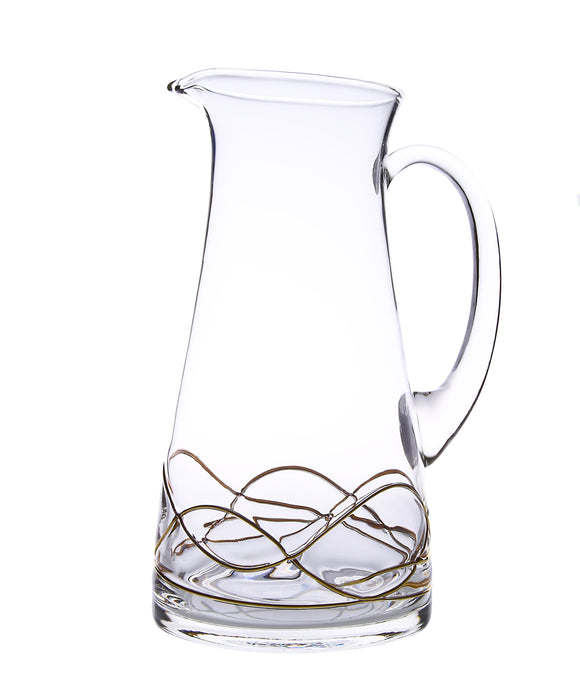 Glass pitcher with gold